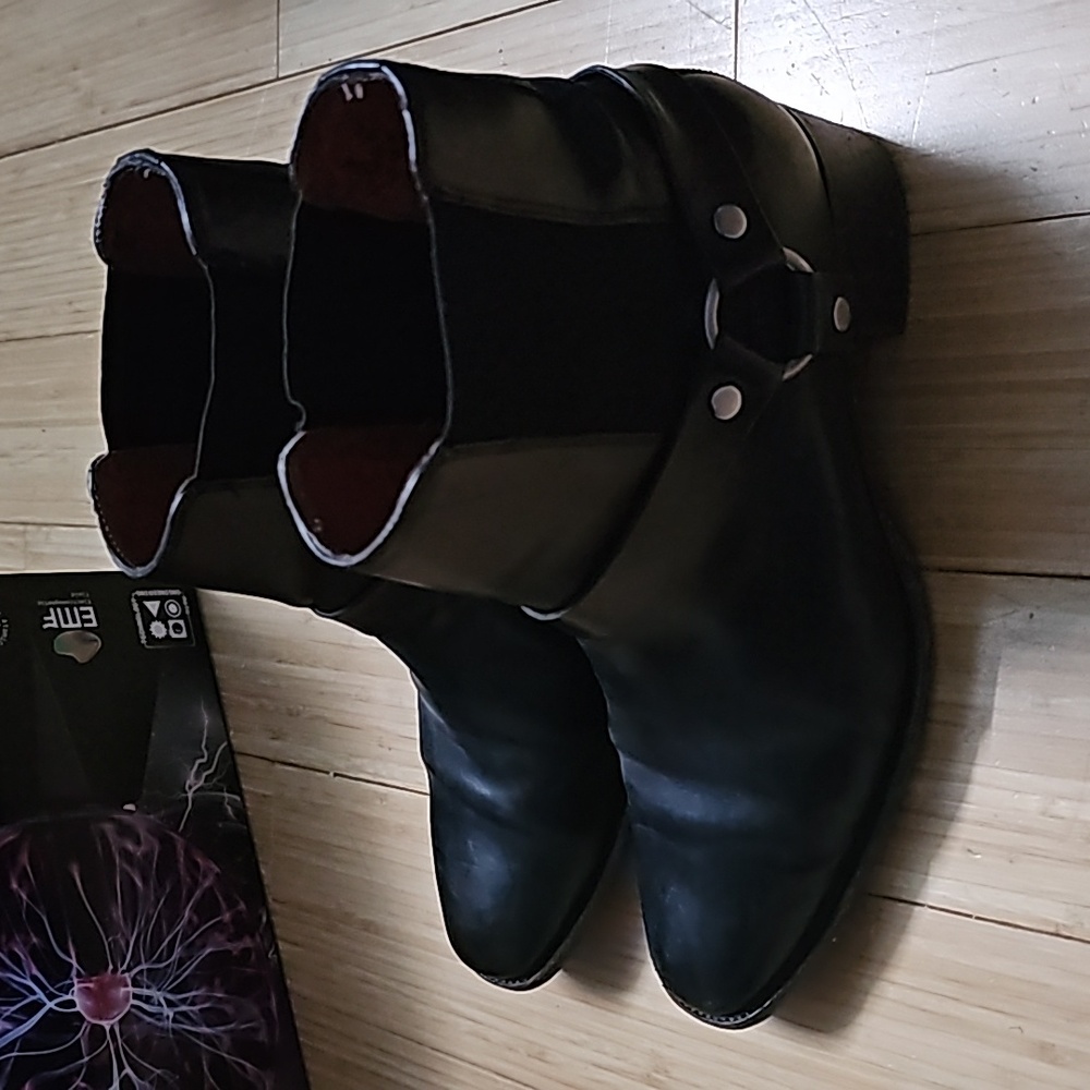 Size 9 Frye black leather ankle boots with silver hardware.